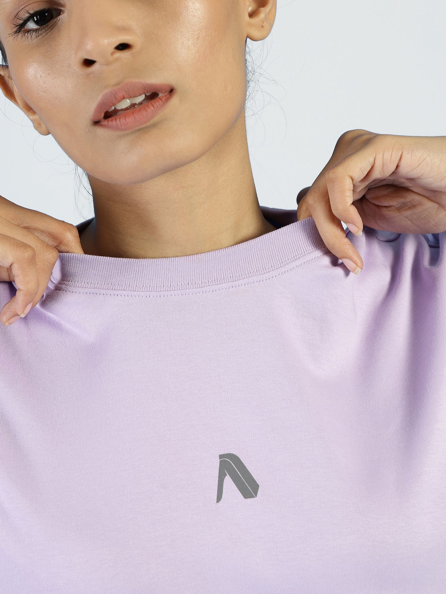 Close-up of ALP Mode Lilac Interlock T-Shirt fabric – Breathable Activewear