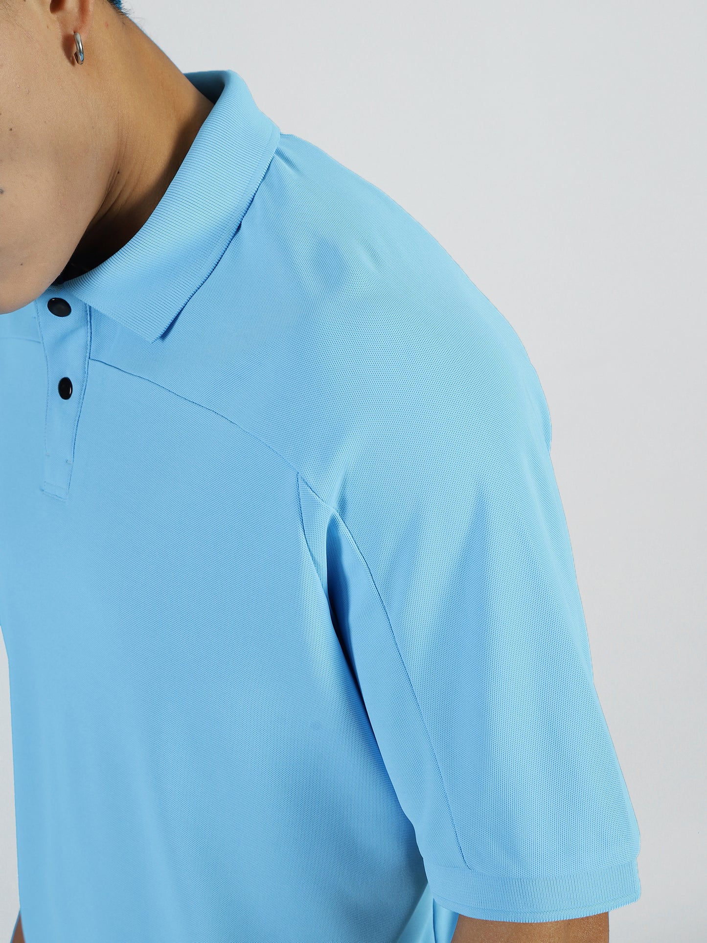 Close-up of ALP Mode Sky Blue Polo T-Shirt fabric – Breathable Activewear