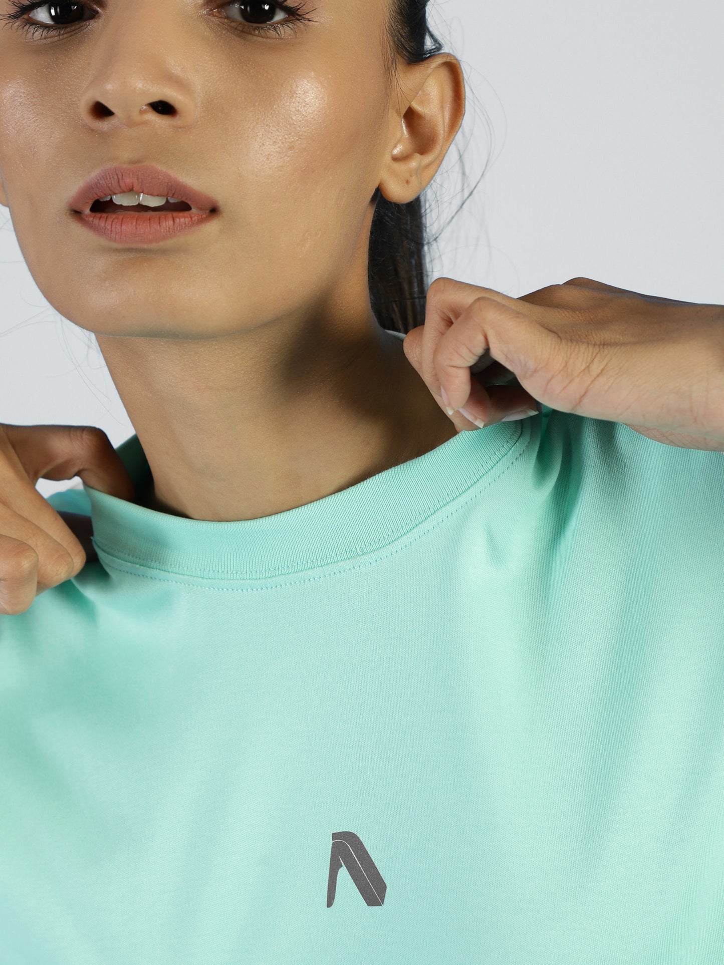 Close-up of ALP Mode Green Interlock T-Shirt fabric – Breathable Activewear