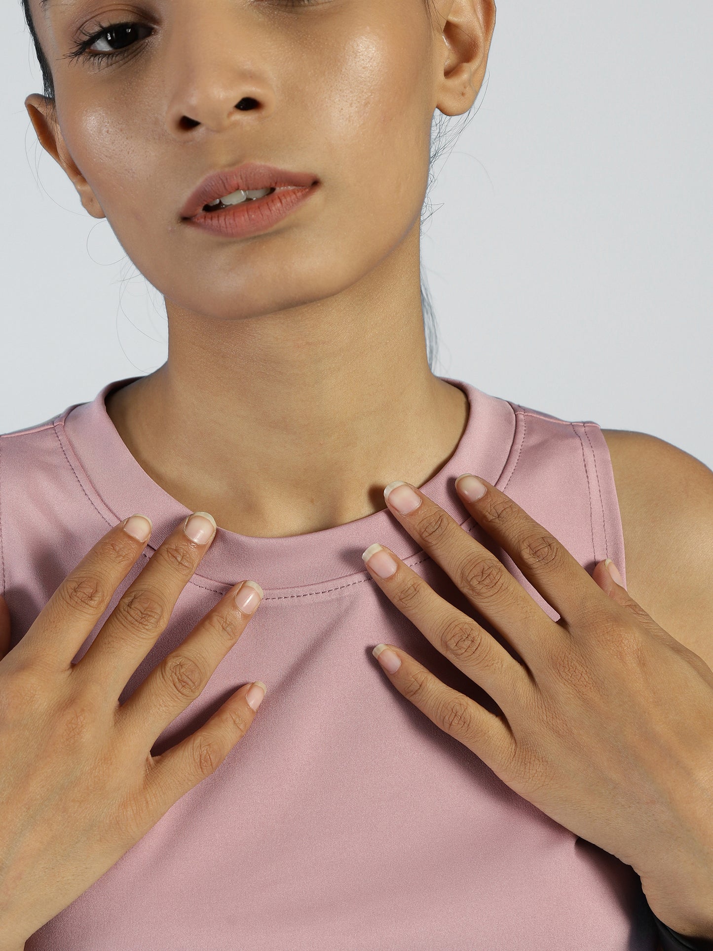 Close-up of ALP Mode Pink Tank Top fabric – Breathable Activewear