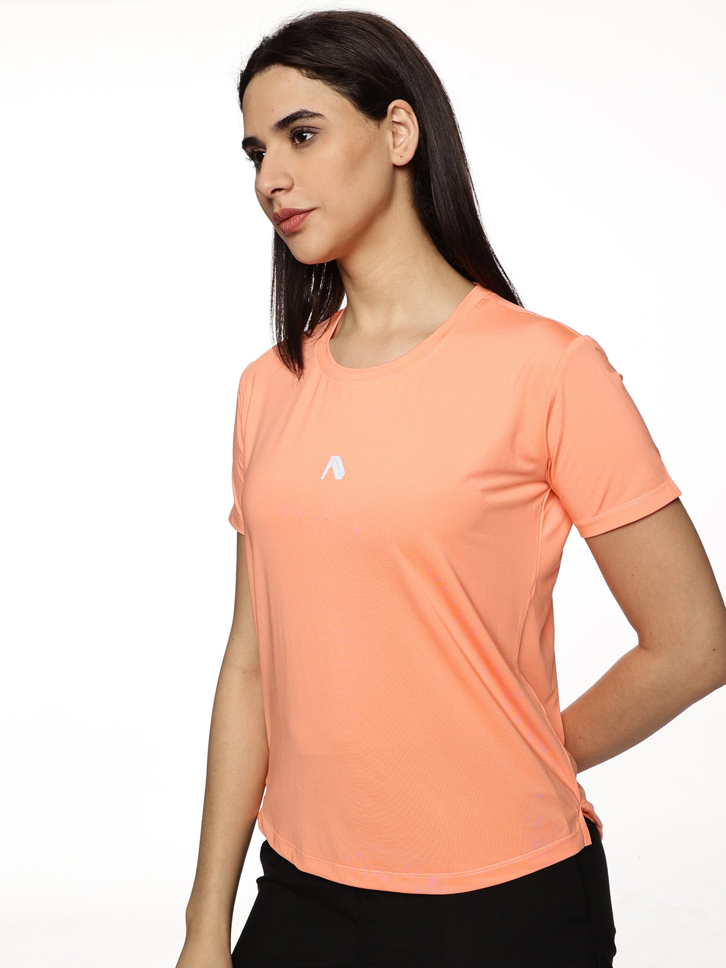 Model wearing ALP Mode Salmon Pink Performance T-Shirt during workout
