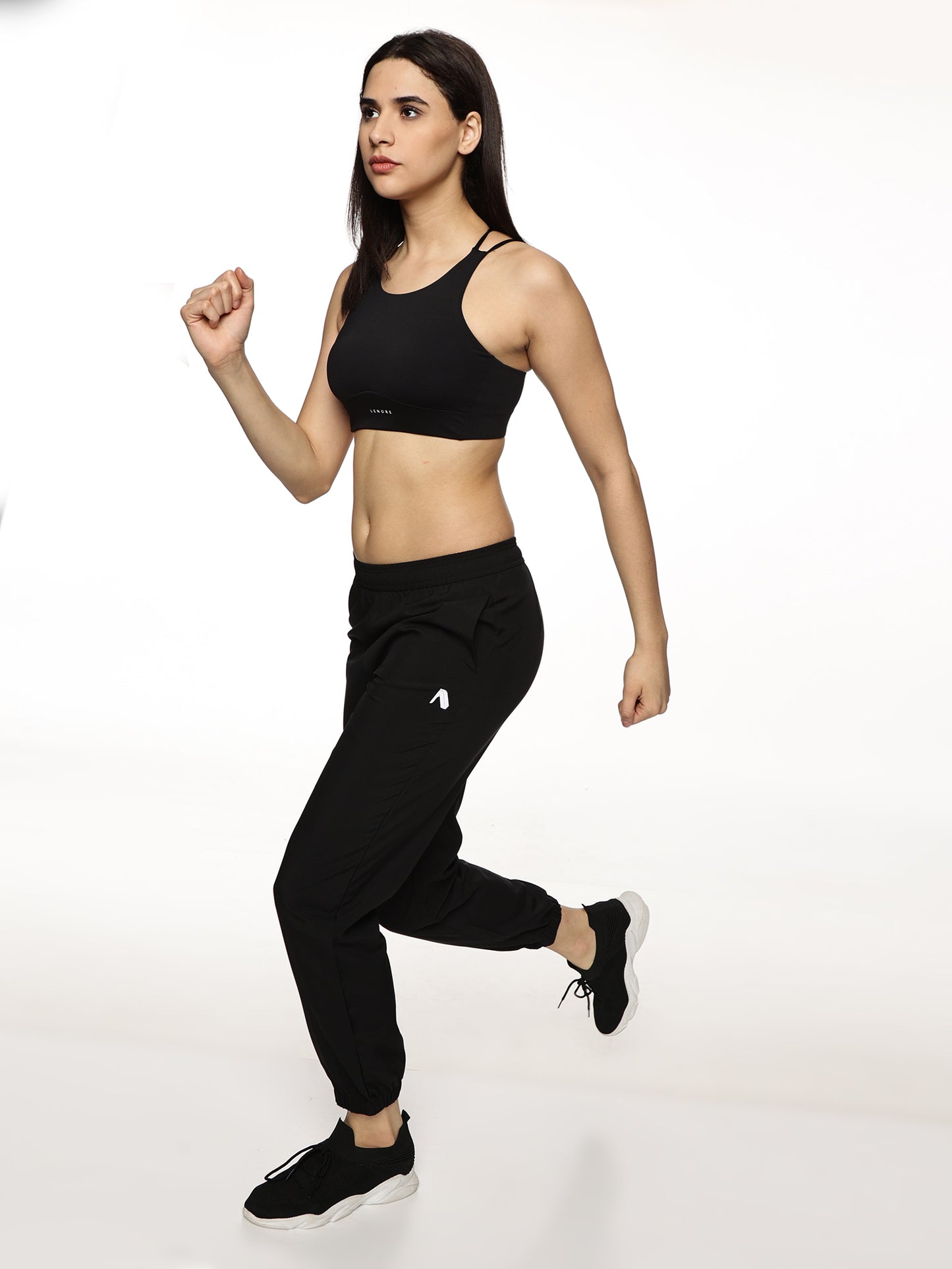 Model wearing ALP Mode Black Running Track Pant during workout